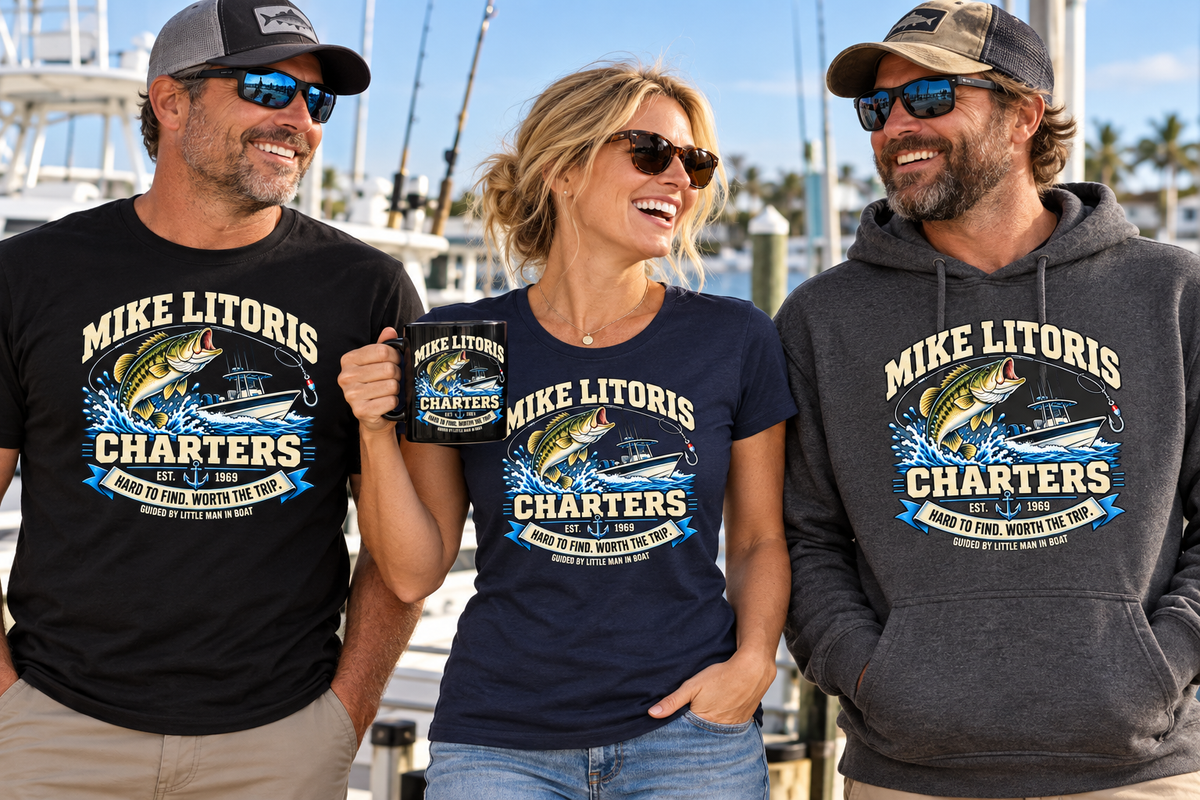 Adults wearing Mike Litoris Fishing Charters T-shirts and hoodie with a matching black coffee mug at a marina